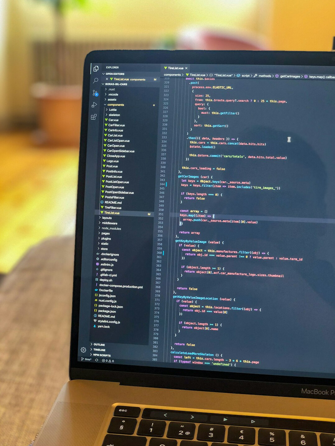 laptop with code editor