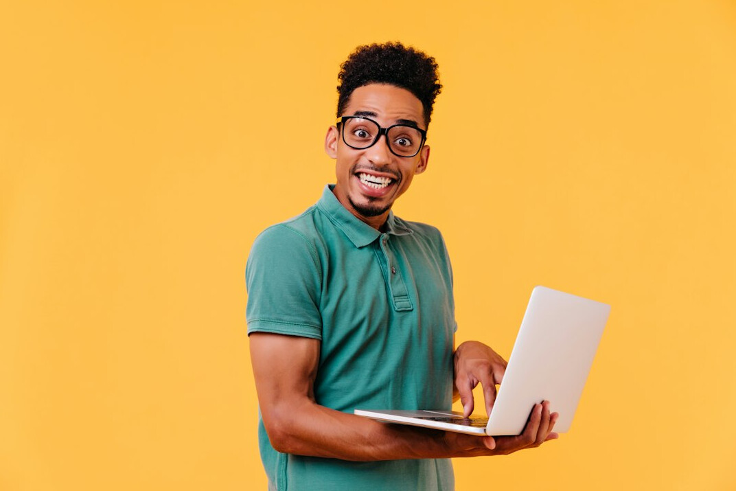 successful programmer smiling