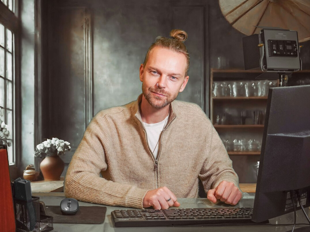 beginner programmer at desk