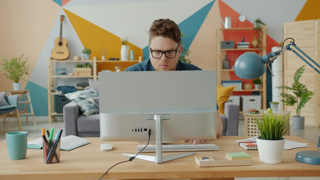person coding at home