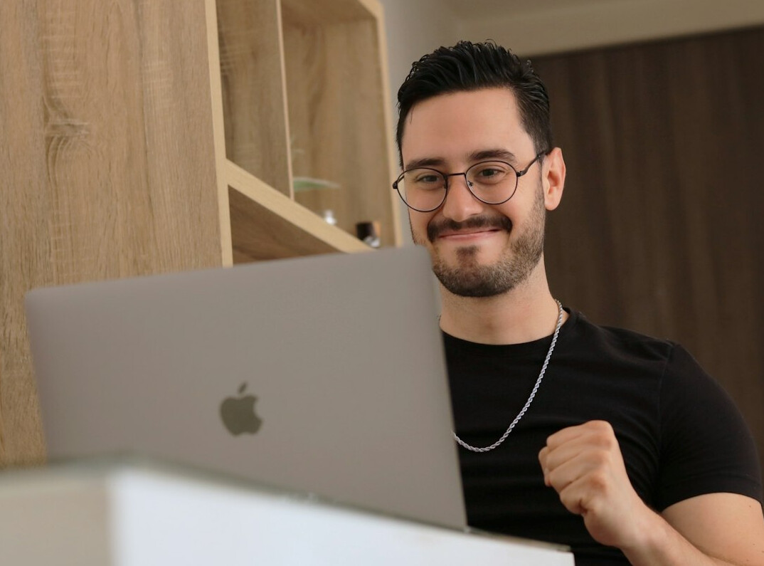 young person achieving success with code