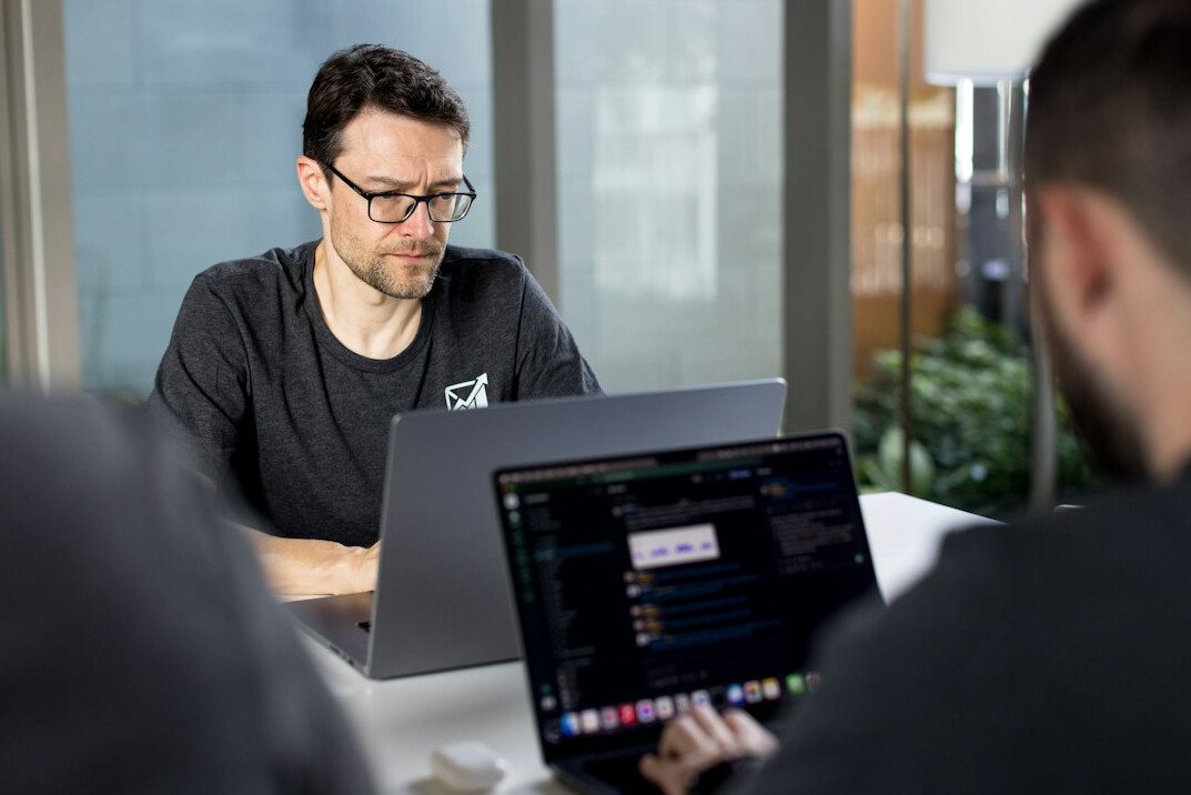 person learning to code on laptop